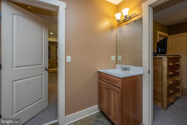 bathroom with tile flooring and large vanity