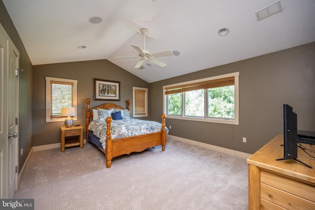 bedroom featuring vaulted ceiling, ceiling fan, and carpet floors