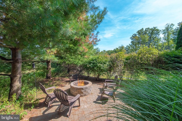 view of patio featuring a fire pit