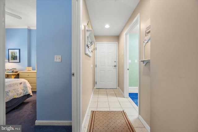 hallway with light tile patterned floors