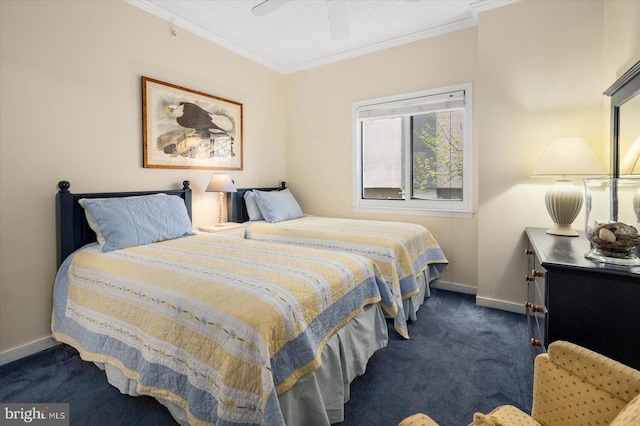 bedroom with crown molding, dark carpet, and ceiling fan