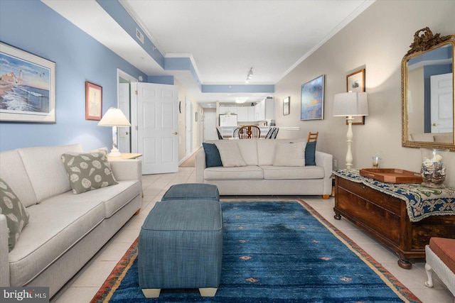 tiled living room featuring ornamental molding