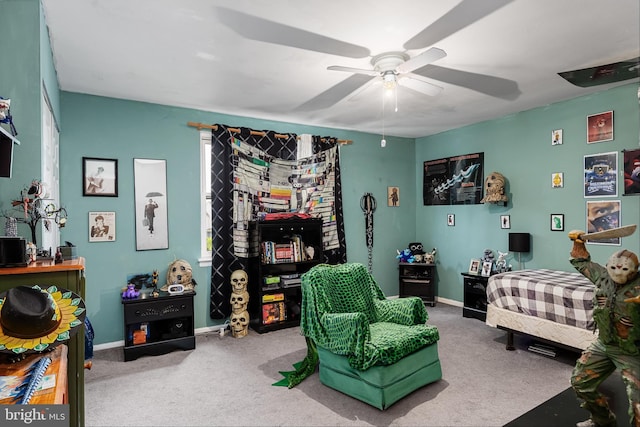 interior space featuring carpet and ceiling fan