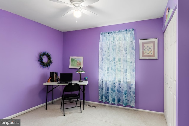 office area with carpet floors and ceiling fan