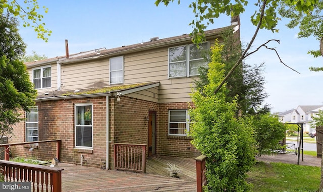 rear view of house with a deck