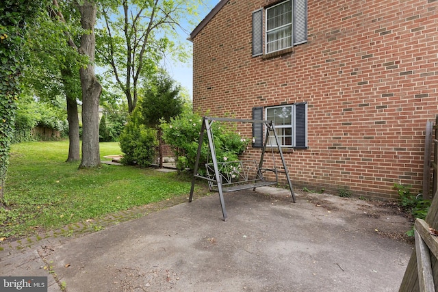 exterior space with a yard and a patio