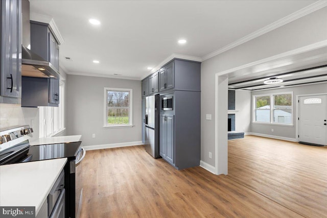 kitchen with stainless steel fridge with ice dispenser, a brick fireplace, crown molding, electric range, and light wood-type flooring