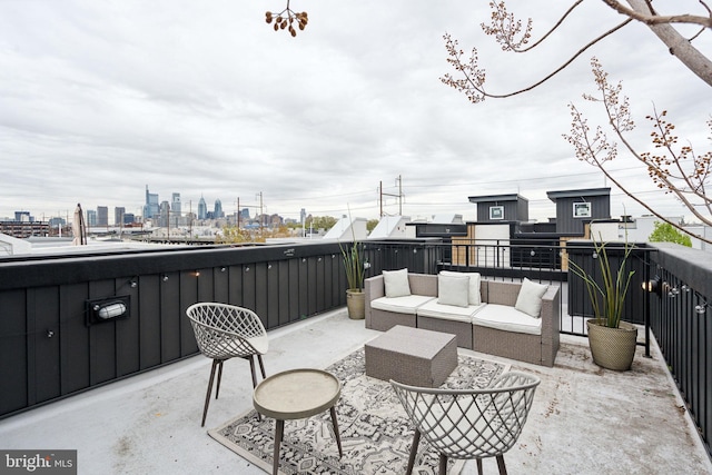 view of patio featuring a balcony and an outdoor hangout area