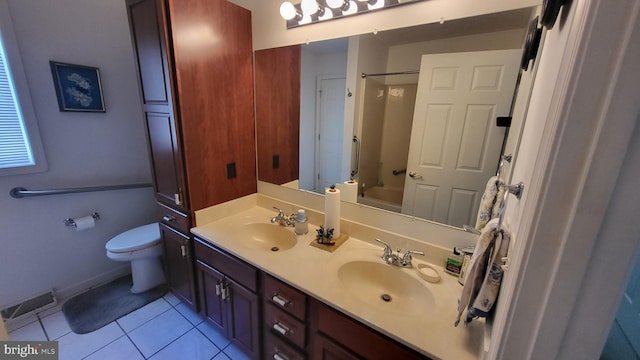 full bathroom featuring dual bowl vanity, tub / shower combination, toilet, and tile flooring