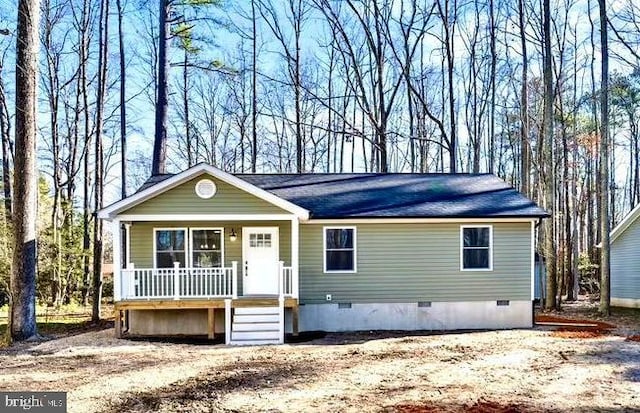 view of front of house with covered porch and crawl space