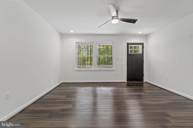 interior space with ceiling fan, baseboards, wood finished floors, and recessed lighting