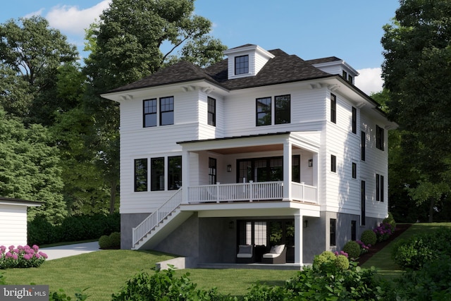 view of front facade featuring a front yard and a patio