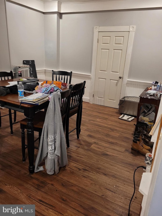 dining room with dark hardwood / wood-style floors