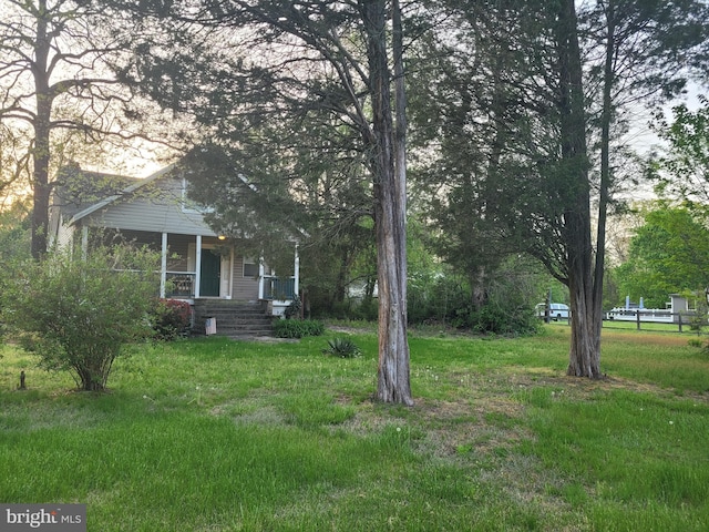 view of yard with a porch