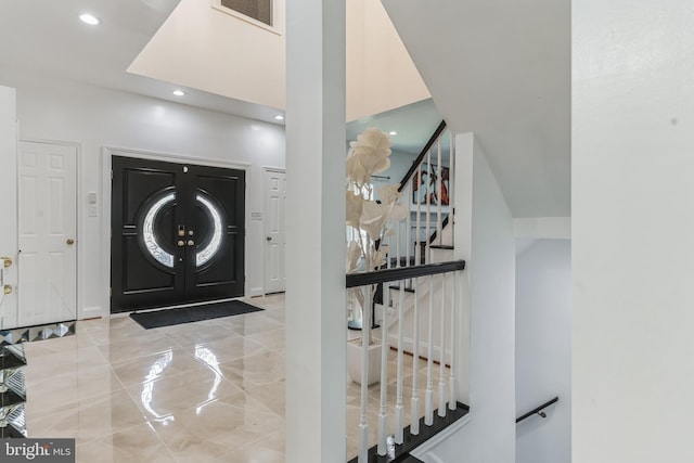 entryway with light tile flooring