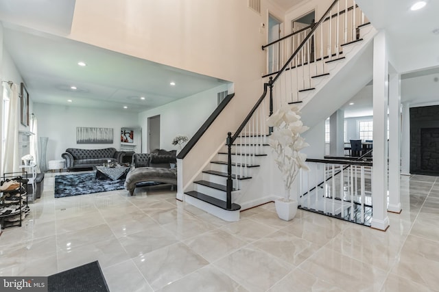 stairs with light tile floors