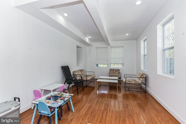 sitting room with hardwood / wood-style flooring