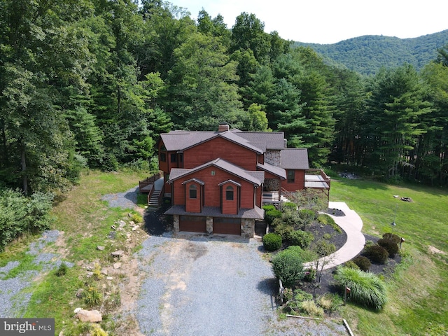 drone / aerial view featuring a mountain view