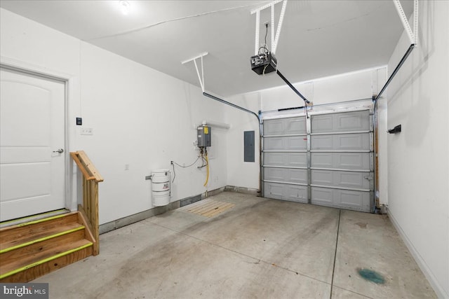 garage featuring a garage door opener and electric panel