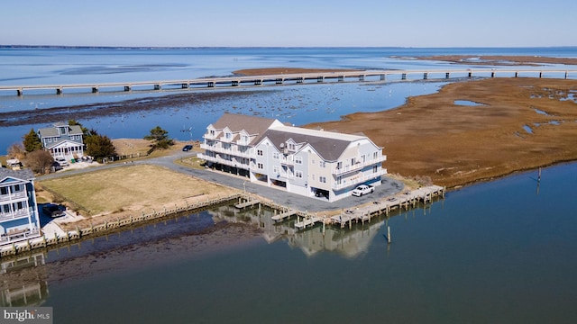 drone / aerial view with a water view