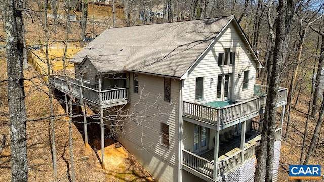 exterior space featuring a balcony