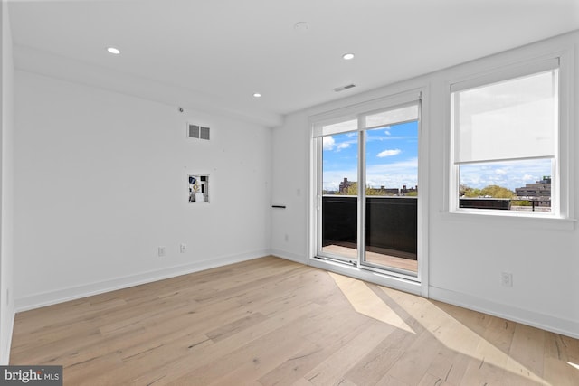 empty room featuring light hardwood / wood-style floors