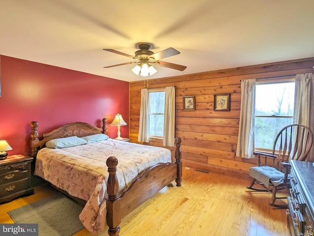 bedroom featuring light hardwood / wood-style flooring and ceiling fan