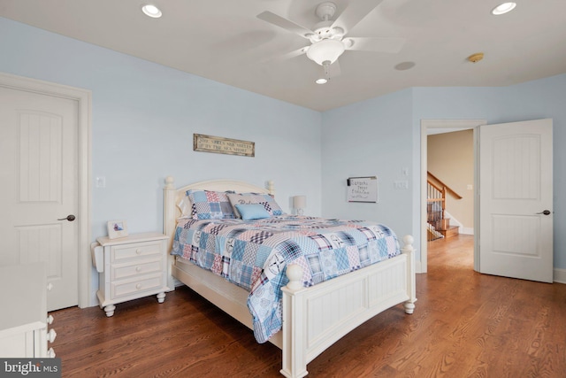 bedroom featuring ceiling fan and dark wood-type flooring