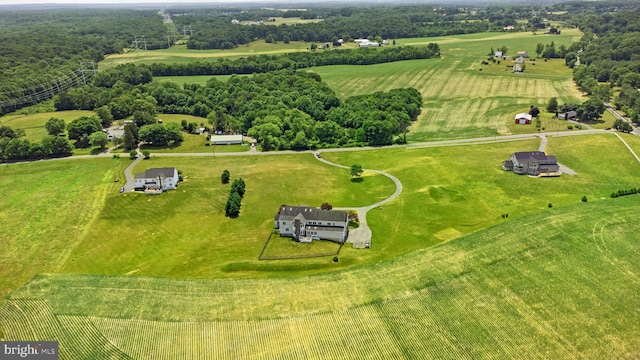 birds eye view of property featuring a rural view