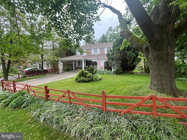 view of front of property with a front lawn