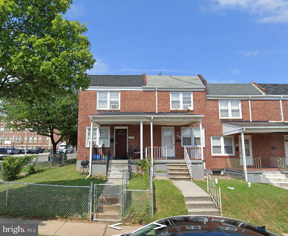 view of property with covered porch