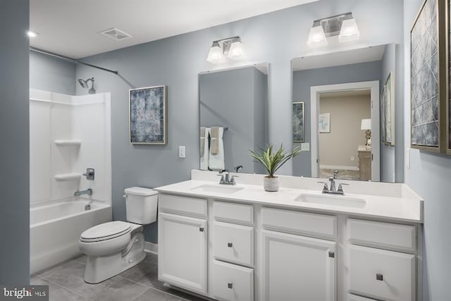 full bathroom with toilet, vanity, and washtub / shower combination