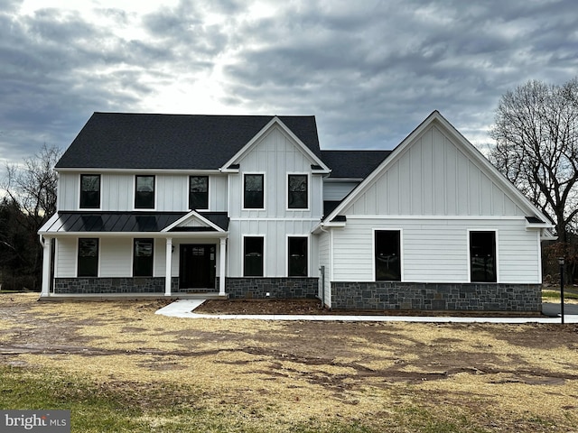 modern inspired farmhouse with a porch