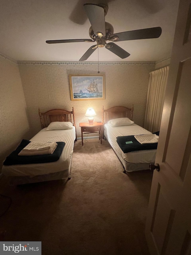 carpeted bedroom featuring ceiling fan