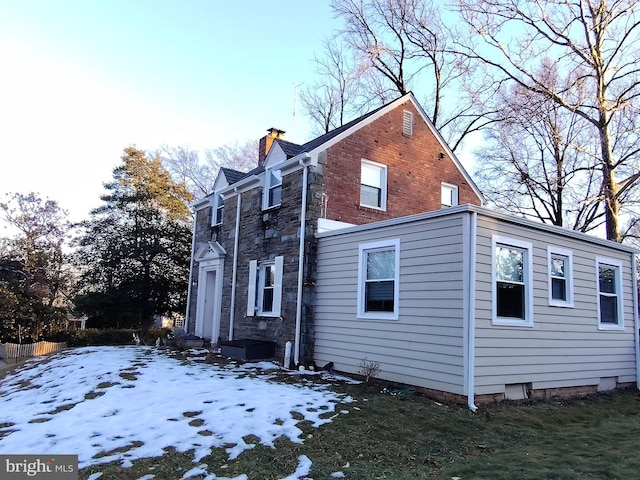 view of snow covered property