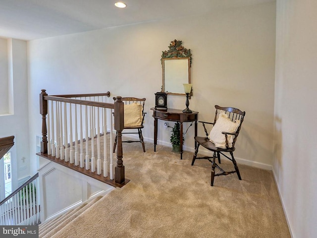 sitting room with light carpet