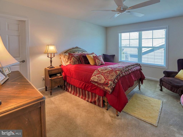 bedroom featuring ceiling fan and carpet floors