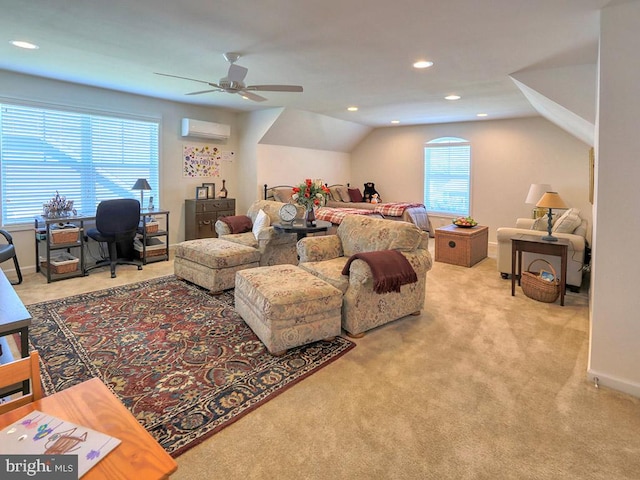 carpeted living room with vaulted ceiling, ceiling fan, a wealth of natural light, and a wall unit AC