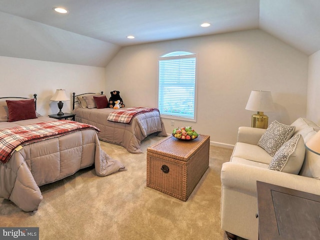 carpeted bedroom featuring vaulted ceiling