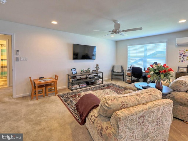 carpeted living room with ceiling fan and a wall mounted air conditioner