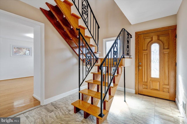 entrance foyer featuring a wealth of natural light