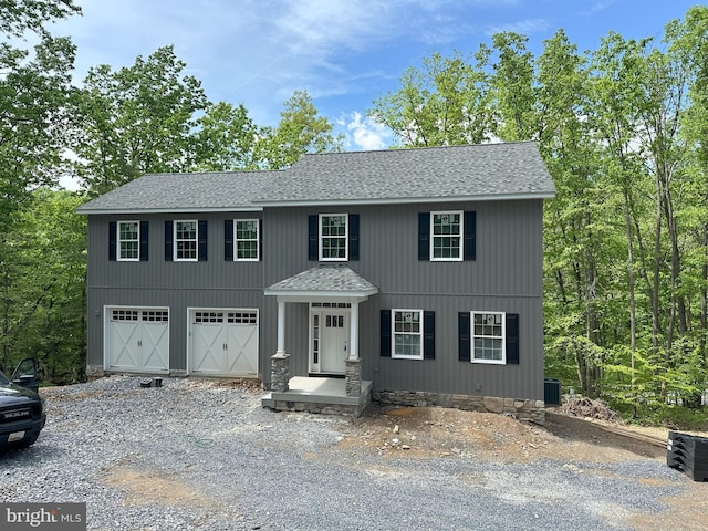 view of front of property with a garage