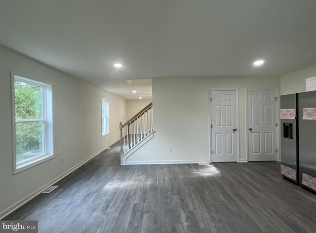 interior space with dark wood-type flooring