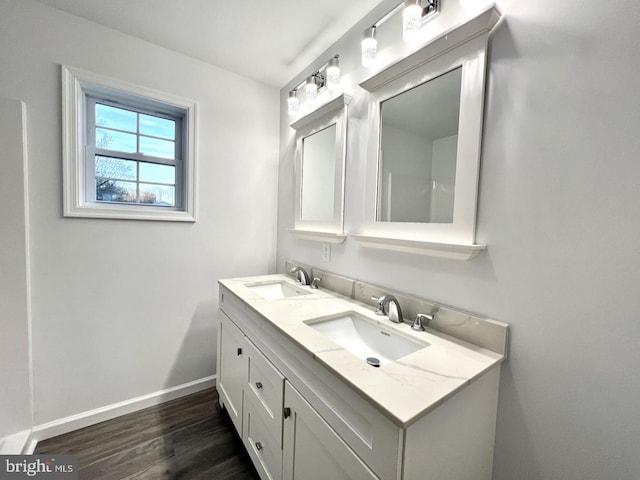 bathroom featuring vanity and hardwood / wood-style floors