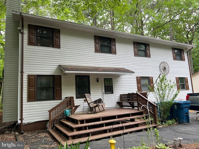 view of front of house with a wooden deck