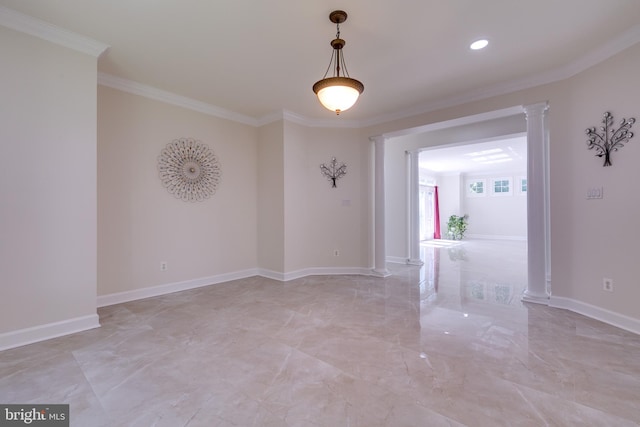 tiled empty room with ornamental molding and decorative columns