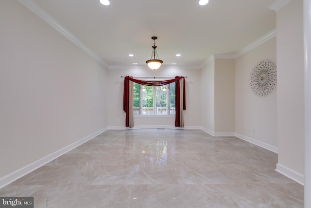 tiled spare room with ornamental molding