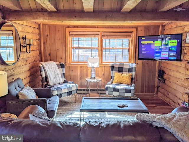 living room with wooden ceiling, a baseboard radiator, beam ceiling, and rustic walls