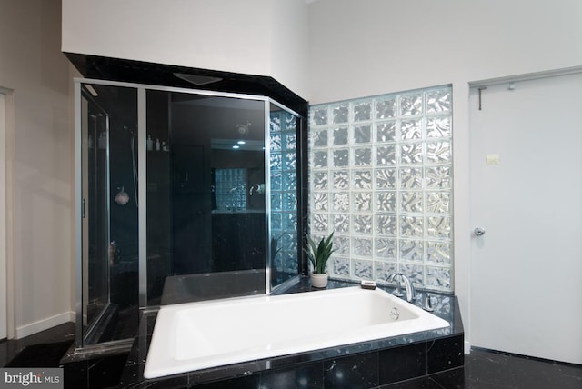 bathroom with independent shower and bath