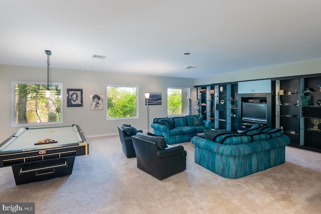 carpeted living room featuring pool table and plenty of natural light